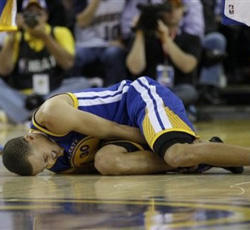 Video: Stephen Curry Re-Injures Ankle | SLAM