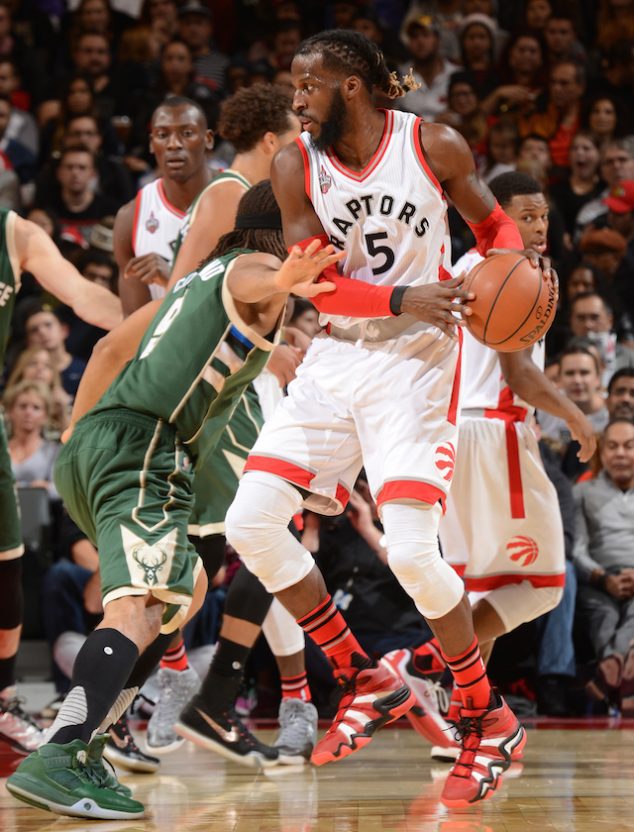 TORONTO, CANADA - NOVEMBER 1: DeMarre Carroll #5 of the Toronto Raptors handles the ball against the Milwaukee Bucks during the game on November 1, 2015 at the Air Canada Centre in Toronto, Ontario, Canada. NOTE TO USER: User expressly acknowledges and agrees that, by downloading and or using this Photograph, user is consenting to the terms and conditions of the Getty Images License Agreement. Mandatory Copyright Notice: Copyright 2015 NBAE (Photo by Ron Turenne/NBAE via Getty Images)