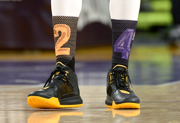 LOS ANGELES, CA - MARCH 6: Larry Nance Jr. #7 of the Los Angeles Lakers and his teammates wear Kobe Bryant-themed socks to honor him during the basketball game against Golden State Warriors at Staples Center March 6, 2016, in Los Angeles, California. NOTE TO USER: User expressly acknowledges and agrees that, by downloading and or using the photograph, User is consenting to the terms and conditions of the Getty Images License Agreement. (Photo by Kevork Djansezian/Getty Images)