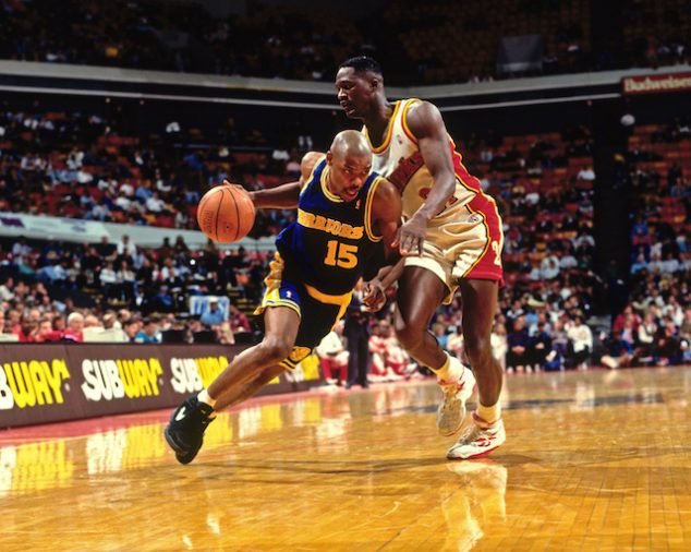 ATLANTA - 1994: Latrell Sprewell #15 of the Golden State Warriors dribbles against the Atlanta Hawks circa 1994 at the Omni in Atlanta, Georgia. NOTE TO USER: User expressly acknowledges and agrees that, by downloading and or using this photograph, User is consenting to the terms and conditions of the Getty Images License Agreement. Mandatory Copyright Notice: Copyright 1994 NBAE (Photo by Scott Cunningham/NBAE via Getty Images)