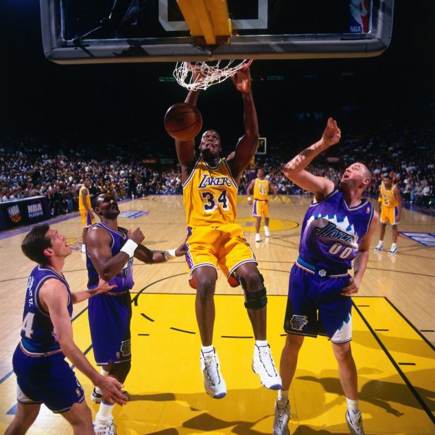 INGLEWOOD, CA - MAY 8: Shaquille O'Neal #34 of the Los Angeles Lakers dunks against the Utah Jazz in Game Three of the Western Conference Semifinals during the 1997 NBA Playoffs at the Great Western Forum on May 8, 1997 in Inglewood, California. The Lakers defeated the Jazz 104-84. NOTE TO USER: User expressly acknowledges and agrees that, by downloading and or using this photograph, User is consenting to the terms and conditions of the Getty Images License Agreement. Mandatory Copyright Notice: Copyright 1997 NBAE (Photo by Andrew D. Bernstein/NBAE via Getty Images)