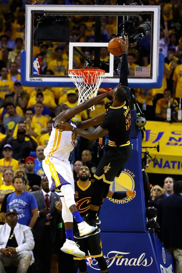 OAKLAND, CA - JUNE 19: LeBron James #23 of the Cleveland Cavaliers is fouled by Draymond Green #23 of the Golden State Warriors in Game 7 of the 2016 NBA Finals at ORACLE Arena on June 19, 2016 in Oakland, California. NOTE TO USER: User expressly acknowledges and agrees that, by downloading and or using this photograph, User is consenting to the terms and conditions of the Getty Images License Agreement. (Photo by Ezra Shaw/Getty Images)