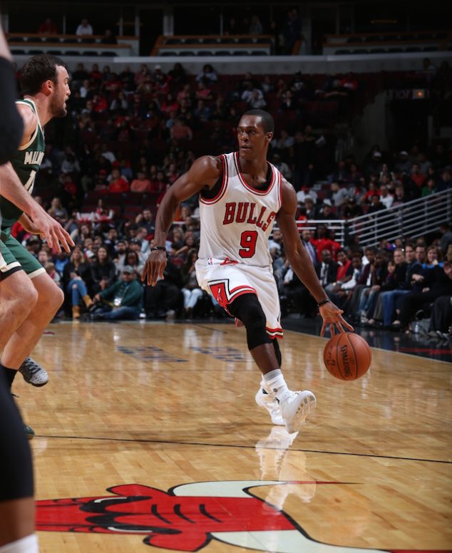 CHICAGO, IL - OCTOBER 3: Rajon Rondo #9 of the Chicago Bulls dribbles the ball against the Milwaukee Bucks during a preseason game on October 3, 2016 at United Center in Chicago, IL. NOTE TO USER: User expressly acknowledges and agrees that, by downloading and/or using this Photograph, user is consenting to the terms and conditions of the Getty Images License Agreement. Mandatory Copyright Notice: Copyright 2016 NBAE (Photo by Gary Dineen/NBAE via Getty Images)