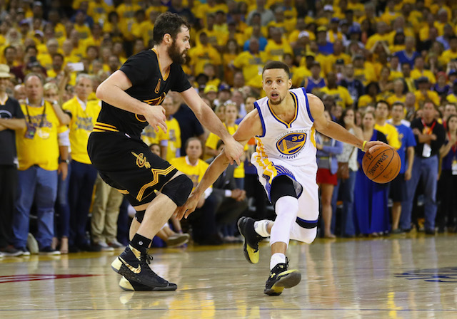 OAKLAND, CA - JUNE 19: Stephen Curry #30 of the Golden State Warriors handles the ball against Kevin Love #0 of the Cleveland Cavaliers during the second half in Game 7 of the 2016 NBA Finals at ORACLE Arena on June 19, 2016 in Oakland, California. NOTE TO USER: User expressly acknowledges and agrees that, by downloading and or using this photograph, User is consenting to the terms and conditions of the Getty Images License Agreement. (Photo by Ezra Shaw/Getty Images)