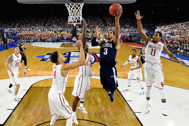 HOUSTON, TEXAS - APRIL 02: Josh Hart #3 of the Villanova Wildcats drives to the basket against Jamuni McNeace #4 of the Oklahoma Sooners, Buddy Hield #24, and Isaiah Cousins #11 in the second half during the NCAA Men's Final Four Semifinal at NRG Stadium on April 2, 2016 in Houston, Texas. (Photo by Robert Deutsch - Pool/Getty Images)