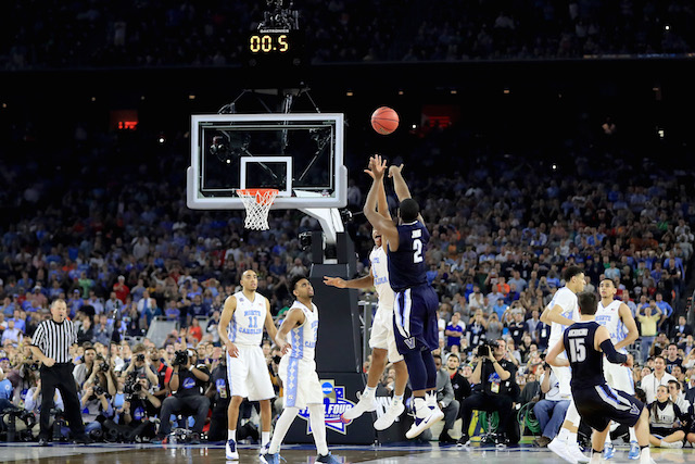 HOUSTON, TEXAS - APRIL 04: Kris Jenkins #2 of the Villanova Wildcats shoots the game-winning three pointer to defeat the North Carolina Tar Heels 77-74 in the 2016 NCAA Men's Final Four National Championship game at NRG Stadium on April 4, 2016 in Houston, Texas. (Photo by Ronald Martinez/Getty Images)