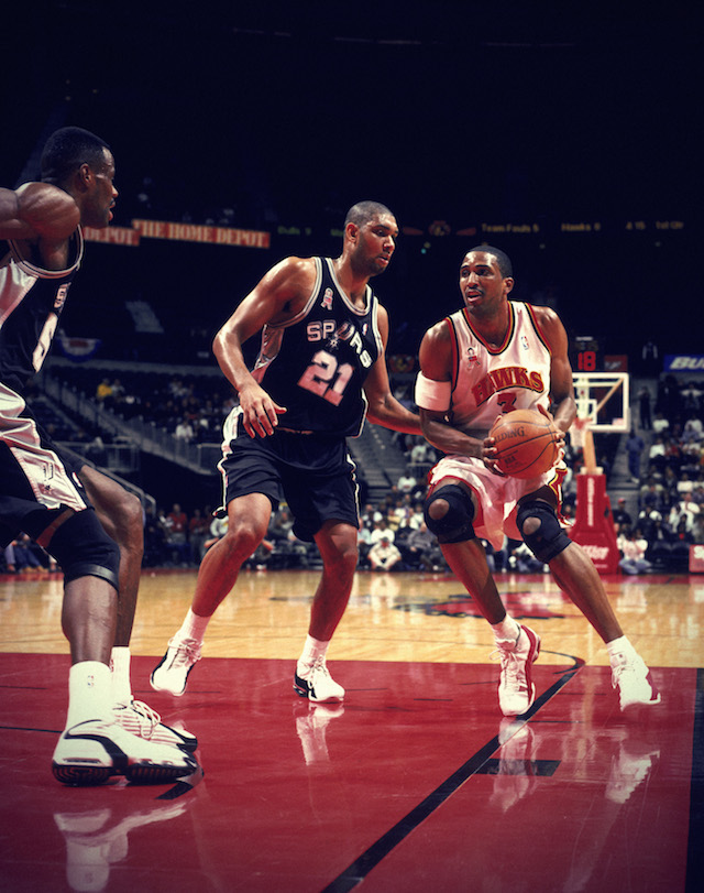 5 Dec 2001: Forward Shareef Abdur-Rahim #3 of the Atlanta Hawks holds the ball as forward Tim Duncan #21 of the San Antonio Spurs plays defense during the NBA game at the Phillips Arena in Atlanta, Georgia. The Spurs defeated the Hawks 120-112. NOTE TO USER: User expressly acknowledges and agrees that, by downloading and/or using this Photograph, User is consenting to the terms and conditions of the Getty Images License Agreement. Mandatory copyright notice: Copyright 2001 NBAE Mandatory Credit: Scott Cunningham /NBAE/Getty Images