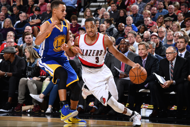 PORTLAND, OR - NOVEMBER 1: C.J. McCollum #3 of the Portland Trail Blazers handles the ball during the game against Stephen Curry #30 of the Golden State Warriors on November 1, 2016 at Moda Center in Portland, Oregon. NOTE TO USER: User expressly acknowledges and agrees that, by downloading and/or using this photograph, user is consenting to the terms and conditions of the Getty Images License Agreement. Mandatory Copyright Notice: Copyright 2016 NBAE (Photo by Garrett Ellwood/NBAE via Getty Images)