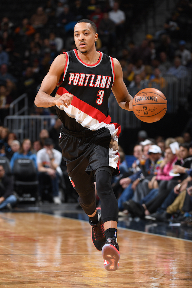 DENVER, CO - DECEMBER 15: C.J. McCollum #3 of the Portland Trail Blazers handles the ball against the Denver Nuggets on December 15, 2016 at the Pepsi Center in Denver, Colorado. NOTE TO USER: User expressly acknowledges and agrees that, by downloading and/or using this Photograph, user is consenting to the terms and conditions of the Getty Images License Agreement. Mandatory Copyright Notice: Copyright 2016 NBAE (Photo by Garrett Ellwood/NBAE via Getty Images)