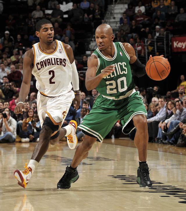 CLEVELAND, OH - JANUARY 31: Ray Allen #20 of the Boston Celtics makes a move aware that Kyrie Irving #2 of the Cleveland Cavaliers is closing in behind him at The Quicken Loans Arena on January 31, 2012 in Cleveland, Ohio. NOTE TO USER: User expressly acknowledges and agrees that, by downloading and/or using this Photograph, user is consenting to the terms and conditions of the Getty Images License Agreement. Mandatory Copyright Notice: Copyright 2012 NBAE (Photo by David Liam Kyle/NBAE via Getty Images)