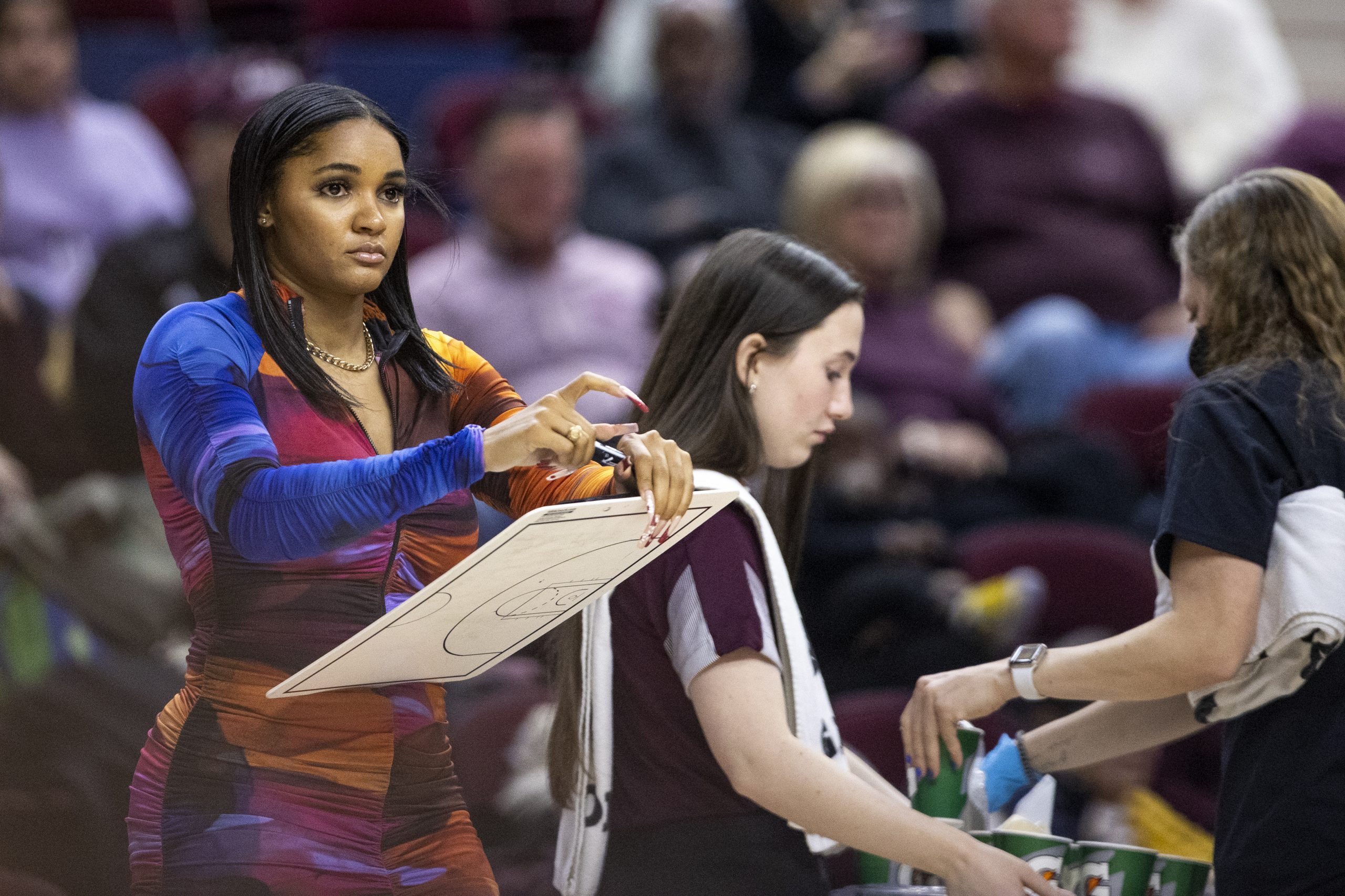 Sydney Carter coaches at A&M