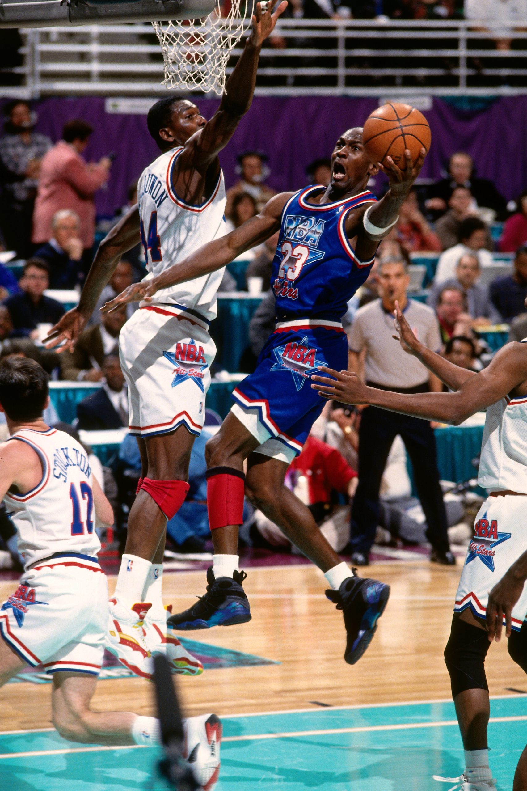 John Stockton of the Western Conference All Stars gets patted on on News  Photo - Getty Images