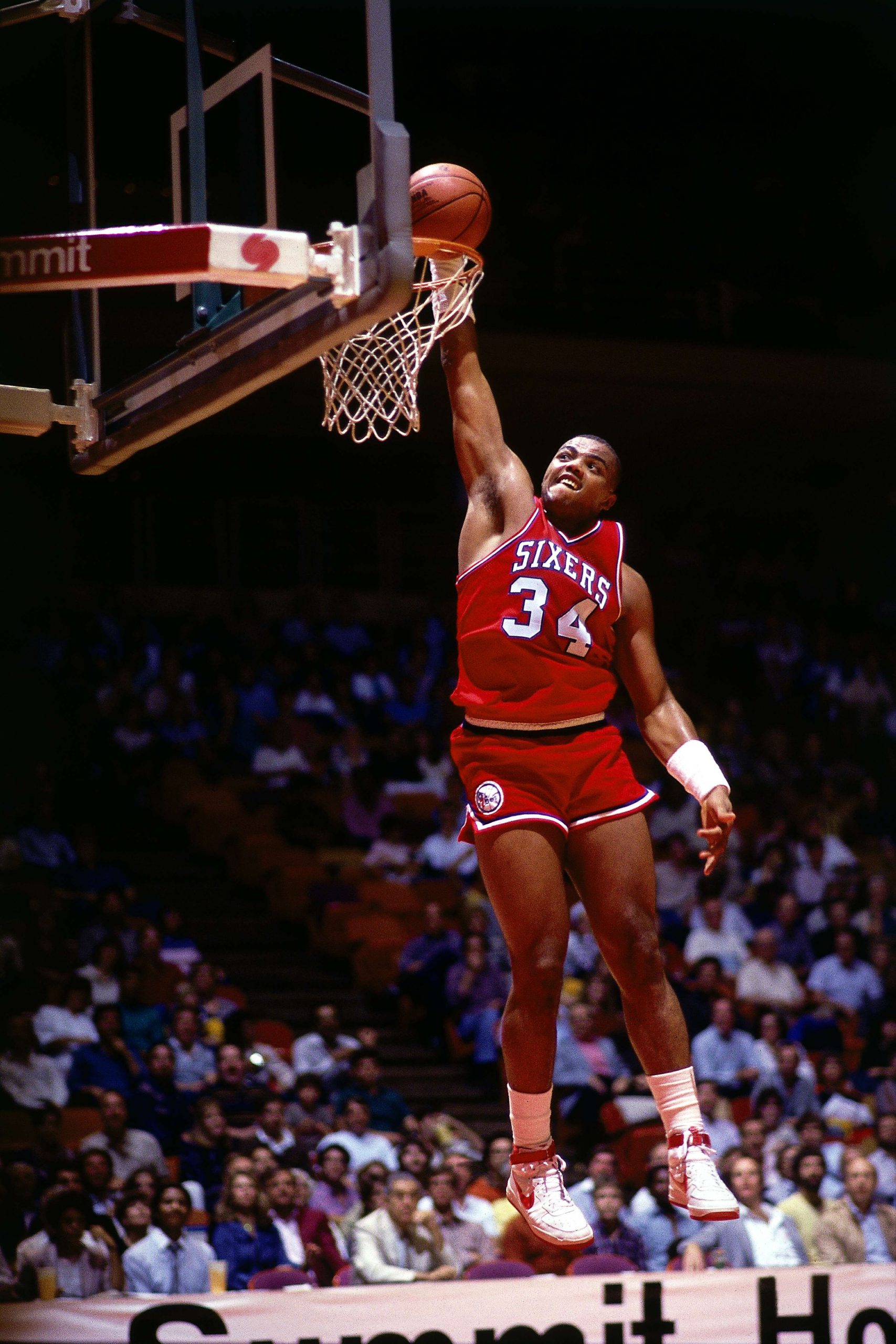 Shaq AKA Shaquel O'Neal Backboard shattering dunk.